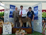 Podio con el Juez Sr Ermano Maniero quien entrego mejor de grupo en categoría cachorro a Galois Reve de Etranger.